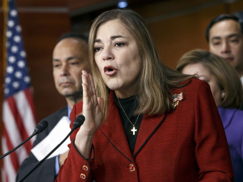 In this Feb. 13, 2015 file photo, Rep. Loretta Sanchez, D-Calif., responds to questions during a Congressional Hispanic Caucus news conference on Capitol Hill in Washington, D.C. 